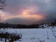 67 Il sole scende tra le nuvole